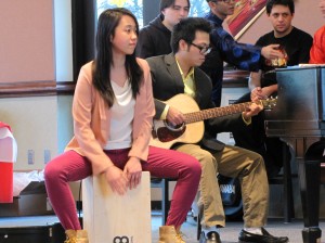 Seniors Anh Vo and Dung Pham play music to open Saturday’s festivities.
