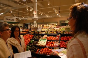 Rabbi Jessica K. Shimberg (right), Ohio Wesleyan’s new Jewish chaplain, works with the Coalition of Immokalee Workers at Whole Foods in Columbus, Ohio.