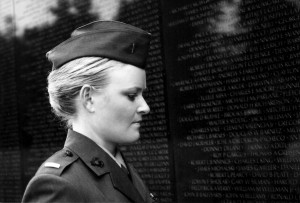 Marine Lieutenant Elle Helmer observes the Vietnam War Memorial in “The Invisible War,” showing at OWU on April 3.