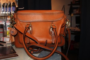 One of CU’s leather purses. Each CU purse has a hidden front pocket to store and access concealed weapons. 