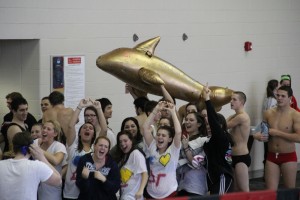 Sorority sisters and fraternity brothers mingle as the Anchor Splash dolphin is carried at the event. 