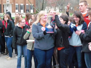 The Orange Team, comprised of Alpha Sigma Phi (Alpha Sig) and Delta Zeta (DZ), won Greek Week’s Spirit Award and the award for most points. In the foreground are sophomores Rebecca Caserta, Marisa Lucian and Courtney Parker of DZ; sophomore Austin Daniels of Alpha Sig is behind them. 