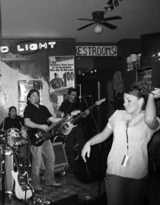 From thebackstretchbar.com: a patron dances to live music at The Backstretch Bar, half a block from Clancey’s. The two bars are popular weekend night destinations for OWU students. Clancey’s admits patrons 18 and older with identification for a $5 fee. The Backstretch admits those 21 and older for free