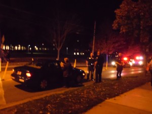 Ohio Wesleyan zoology professor Jed Burtt fills out part of a Delaware Police Department report about the accident involving him and two OWU freshmen Monday evening. The students, Gabriela Colmenares and Hector Rueda, were released from Grant Medical Center and Grady Memorial Hospital late Monday night.