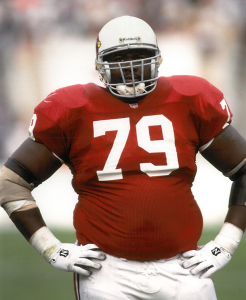 Assistent Ohio Wesleyan football coach Keith Rucker, pictured here in an Arizona Cardinals jersey, played for five teams in his seven-year NFL career. Photos from Keith Rucker