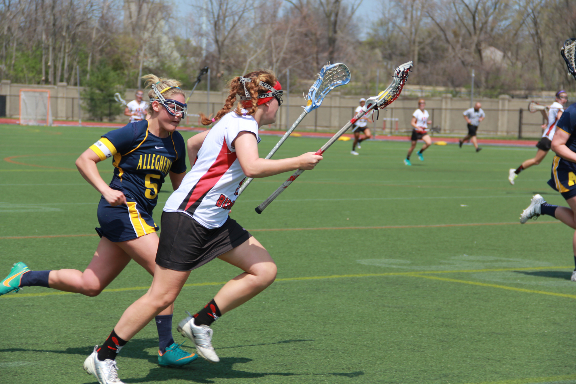 Sophomore Patricia Ryan runs past a defender to score one of her two goals.