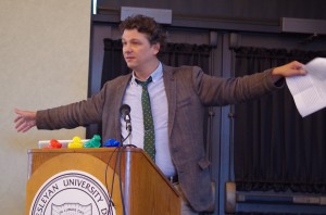Author Donovan Hohn recreates his mention of an albatross in his book “Moby-Duck" during his lecture opening the 30th annual Sagan National Colloquium. Photo by Jane Suttmeier