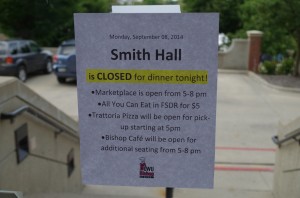A sign posted in Hamilton-Williams Campus Center Monday night detailed the adjusted dining options offered after a burst pipe closed Smith Dining Hall. Photo by Spenser Hickey