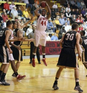 Junior Claude Gray takes a shot in a game against Wooster. Photo: battlingbishops.com