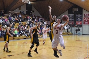 Freshman Nate Axelrod takes on a Depauw defender during last Saturday's game in Branch Rickey Arena.