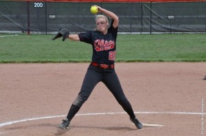 Senior lefthander Sarah Flint throws the ball from the pitcher's mound. Photo courtesy of battlingbishops.com.