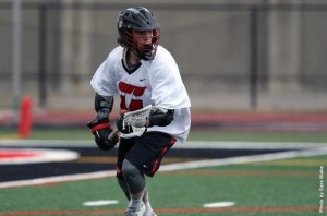 Senior attacker Tommy Winkler seizes up his opponents. Photo courtesy of battlingbishops.com.