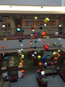 Cubes hang in the Hamilton-Williams Campus Center to advertise the series. Photo courtesy of Sara Hollabaugh.